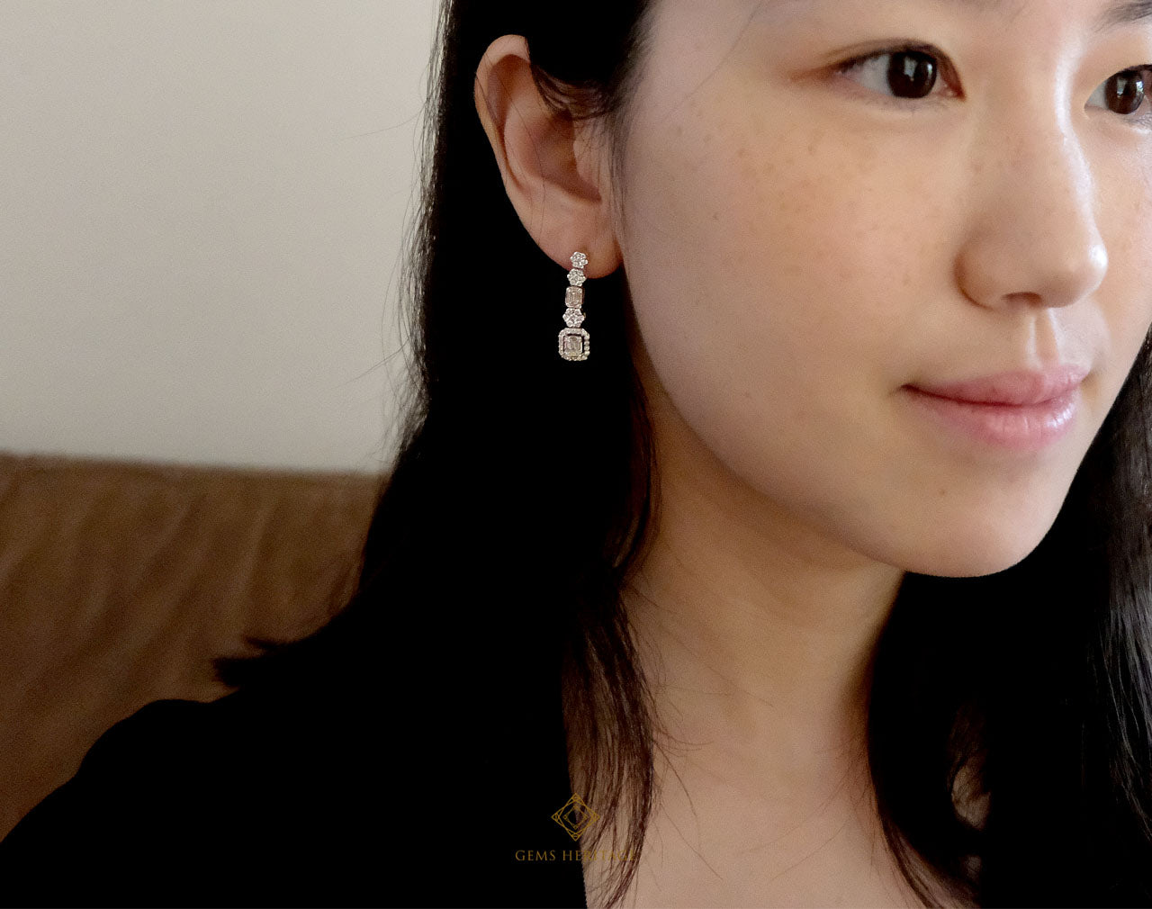 round and emerald cut illusion diamond earring