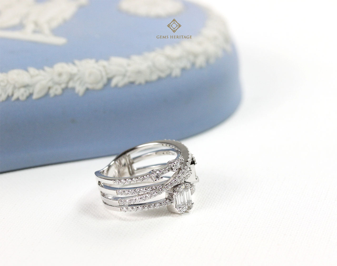 Sophisticated twist emerald cut diamond ring (rwg245)