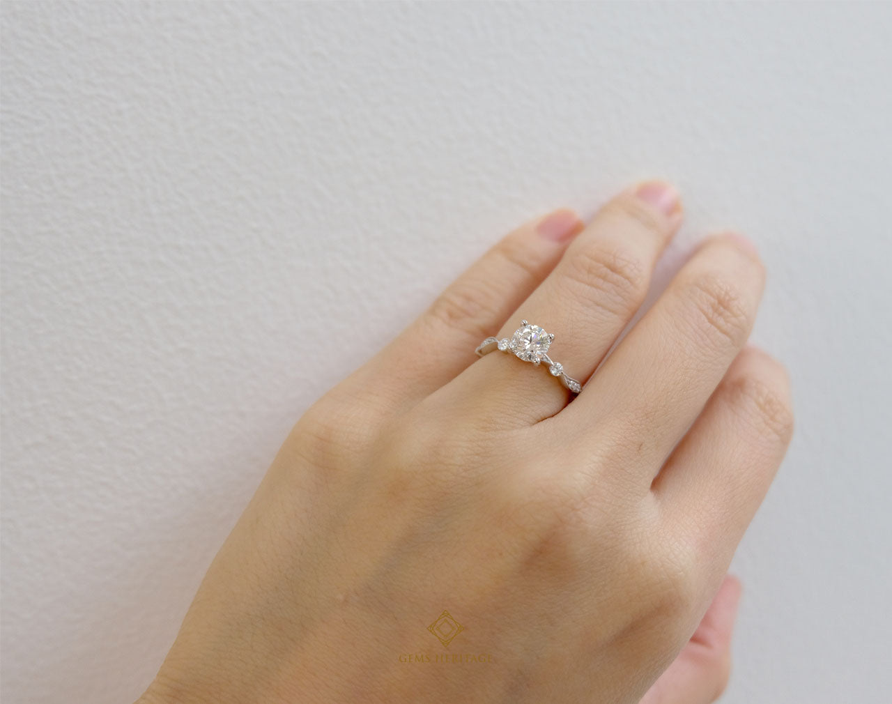 Dot and curve engagement ring